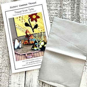 May include: A sewing pattern for a travel iron tote. The pattern includes instructions for making a tote bag with a heat-resistant lining and a built-in ironing pad. The pattern is designed to be "Fat Quarter Friendly" and is sized to hold a mini-size travel iron.