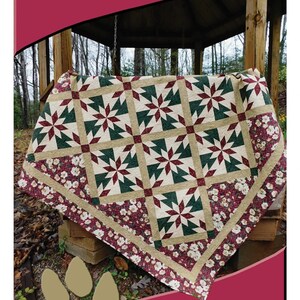 May include: A handmade quilt with a star pattern in green, cream, and burgundy. The quilt is 73 x 73 inches and features a floral border. The text "Huntington" is displayed on the top of the image.