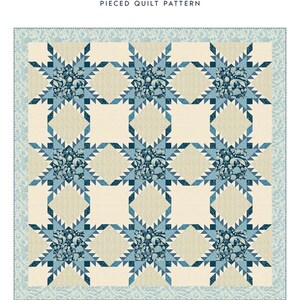 May include: A quilt pattern titled "Feathered Star" by Laundry Basket Quilts. The design features a repeating pattern of blue and cream-colored star shapes with floral details. The quilt size is 76" x 76".