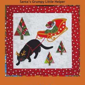May include: A black cat with reindeer antlers pulls a red and gold sleigh filled with presents. The cat is in front of a white background with three Christmas trees. The text "Trouble & Boo Designs" and "Santa's Grumpy Little Helper" is at the top of the image. The text "Kristadyelle@gmail.com" and "All Rights Reserved" is at the bottom of the image.