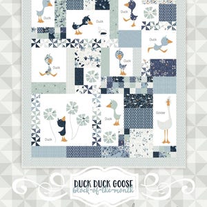 May include: A quilt block pattern featuring a duck and goose design. The block is made up of various blue and white fabrics with floral and geometric patterns. The text "Duck Duck Goose block-of-the-month by meags & me 113" is printed at the bottom of the block.