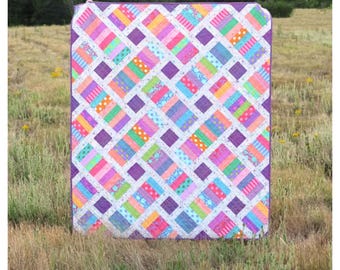 The Iris Quilt *Fat Quarter & Strip Friendly - Pieced Quilt Pattern* By: Erica Jackman of Kitchen Table Quilting