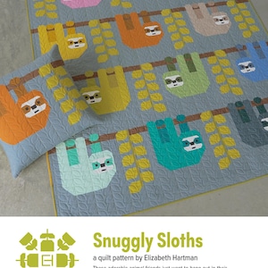 May include: A quilt and pillow set featuring colorful sloths hanging from branches. The sloths are in various colors, including pink, orange, and green, against a light blue background. The quilt has a repeating pattern of sloths and leaves.