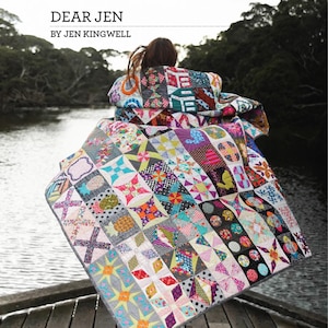 May include: A large patchwork quilt featuring a variety of colorful geometric patterns, floral prints, and polka dots in shades of pink, yellow, blue, and black. The text DEAR JEN BY JEN KINGWELL is printed in the upper left corner of the image.