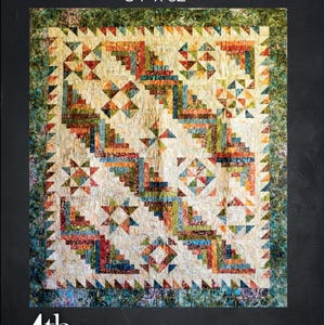 May include: A colorful Log Cabin Sampler quilt, measuring 54" x 62", with a patchwork design. The quilt features various geometric patterns in shades of red, blue, green, and yellow. The text "Log Cabin Sampler" is at the top, with "4th & Main Designs" at the bottom.