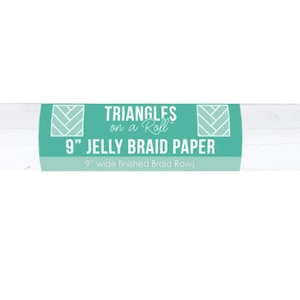 May include: A roll of 9-inch Jelly Braid Paper, wrapped in clear plastic. The paper has a teal and white label with the text "Triangles on a Roll" and "9" Jelly Braid Paper". The label also states "9" wide finished Braid Rows".
