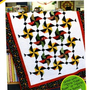 May include: A quilt pattern called "Festivities" designed by Georgette Dell'Orco. The pattern is a strip club pattern for 2 1/2 inch strips. The quilt features a white background with black, red, yellow, and green pinwheel blocks. The quilt is made with The Strip Tube Ruler or The Strip Tube Junior. Eight blocks, table runner, throw, twin, queen, and king sizes are included.