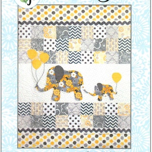 May include: A quilting pattern featuring two elephants, one large and one small, with yellow balloons. The elephants are on a patchwork background with yellow, gray, and white squares. The pattern is titled "Mommy & Me" and is designed by Colette Belt.