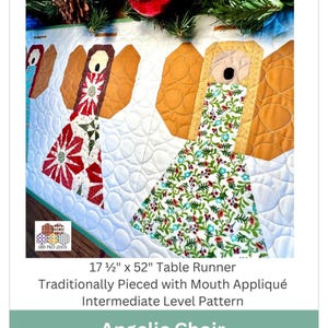 May include: A quilted table runner featuring an angelic choir design. The runner is 17.5 inches by 52 inches and features appliquéd angels with patterned dresses and golden wings. The text "Angelic Choir Table Runner Pattern" is displayed.