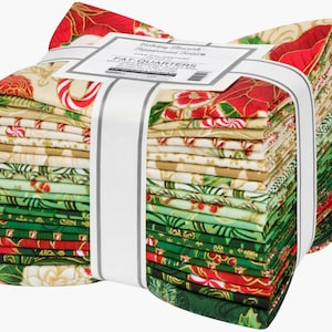 May include: A stack of Christmas-themed fabric fat quarters, wrapped with a white ribbon. The fabric features festive patterns of candy canes, poinsettias, and holly leaves in red, green, and gold. The label reads "Holiday Flourish Peppermint Twist".
