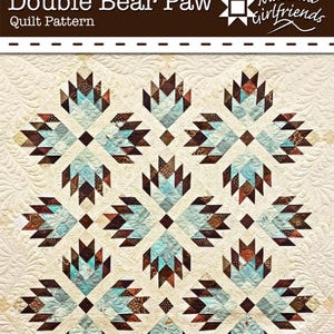 May include: A quilt pattern titled "Double Bear Paw" with a repeating design of bear paw shapes in shades of brown, teal, and cream. The quilt has a detailed, quilted texture and is from Material Girlfriends.