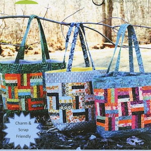 May include: Three fabric tote bags featuring a rail fence quilt pattern in various colors, including green, blue, and orange. The bags have two handles and are displayed hanging from a branch. Text on the image reads Sweet Jane's Quilting & Design, Charm & Scrap Friendly, and Rail Fence Tote.