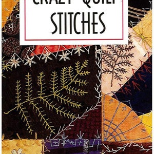 May include: A book cover titled "Crazy Quilt Stitches" with a patchwork design. The cover features a red banner at the top with the words "Pocket Guide." The patchwork includes various colors and embroidered details.