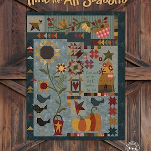 May include: A quilt pattern design featuring a patchwork of various colors and designs, including sunflowers, birds, pumpkins, and a house. The quilt is titled "Time for All Seasons" and is designed by One Sister.
