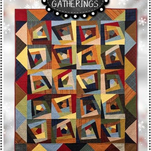May include: A colorful quilt with a geometric design, featuring squares and triangles in shades of red, orange, yellow, blue, and green. The quilt is labeled "SLEIGH RIDE QUILT" and measures 55" x 66". The brand name "PRIMITIVE GATHERINGS" is also displayed.