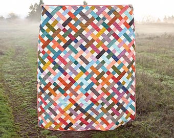 The Charlotte Quilt *Pieced Quilt Pattern - Jelly Roll & Fat Quarter Friendly * By: Erica Jackman of Kitchen Table Quilting