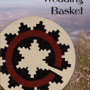 May include: A Navajo wedding basket with a red, black, and white geometric design. The basket is made of fabric and is sitting on a bed of green grass. The text "Navajo Wedding Basket" and "Barbara Morgan" are visible in the image.
