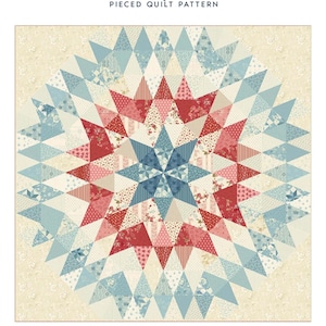 May include: A pieced quilt pattern titled "Liberty Star" with a central star design. The quilt features red, blue, and cream-colored fabrics arranged in a starburst pattern. The finished quilt size is 72.5" x 72.5".