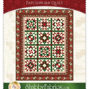 May include: A rectangular patchwork quilt featuring a grid of nine star-patterned blocks in red, green, and cream. The quilt is framed by a dark red border with a floral print and a thin striped inner border. Text reads Poinsettias at Christmas.