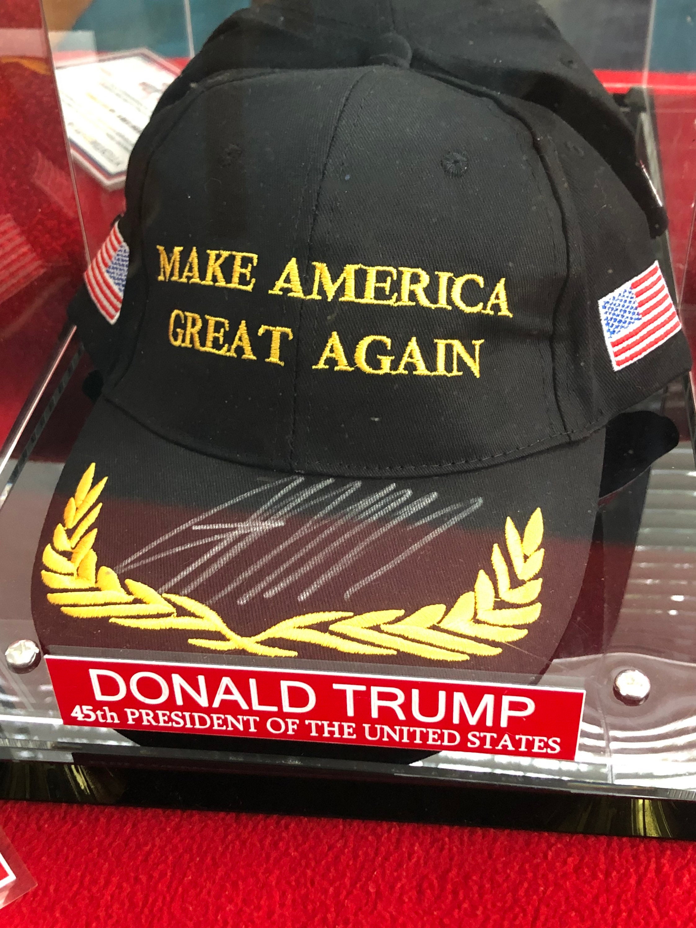 Trump autographed hat hotsell