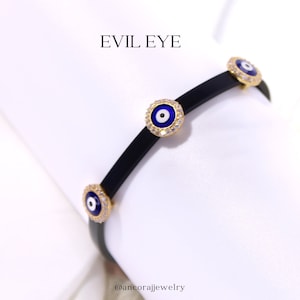 925 Sterling silver evil eye braceket, hamsa black silicone. gold plated Crystals