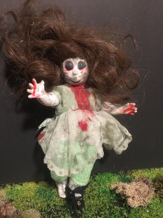 creepy girl doll