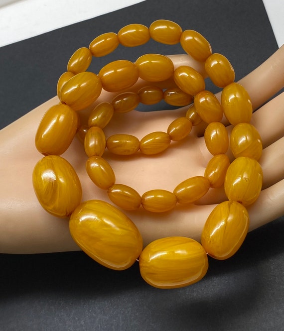 Lot - Antique Butterscotch Amber Bead Necklace (Orange) with Yellow Gold  Plated Hardware
