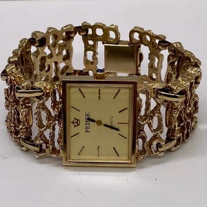 Futura gold nugget watch hotsell