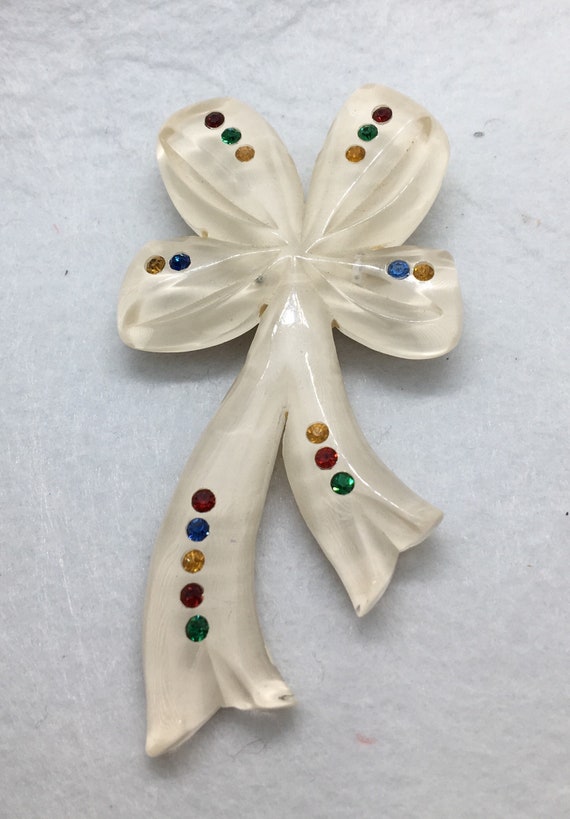 Vintage Bakelite ribbon brooch pin with rhinestone