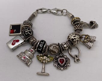 Pulseira vintage Brighton em prata com 17 berloques.