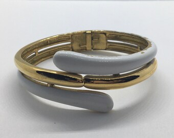 Trifari gold tone white enamel clumpier bypass bangle bracelet