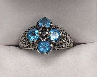 Vintage sterling silver blue topaz ring