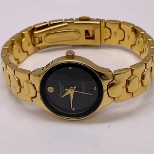 Vintage Gruen Quartz Ladies Gold Tone Black Dial Dainty Elegant Watch Runs Great Vintage Gruen Quartz Ladies Gold Tone Black Dial Dainty  main image 4