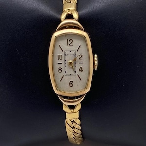 Klasyczny damski zegarek Longines z prostokątną kopertą i 10-karatowym złotem