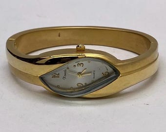 Philippe Pechard bracelet cuff Gold-Tone Minimalist Quartz Watch Vintage Phillipe Pechard Modernist Gold Tone Cuff Watch - Etsy main image 3
