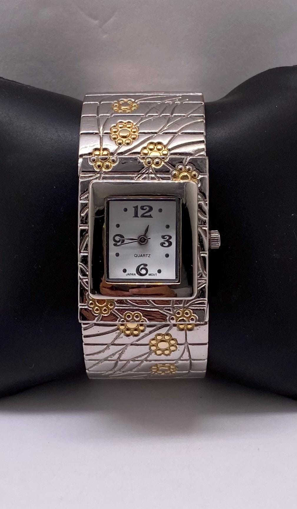 Two Tone Stainless Steel Flower Motif Hinge Cuff Women display picture 1
