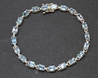 Vintage Sterling Silver Blue Topaz Tennis Bracelet