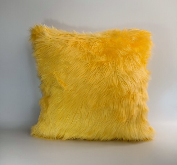 Yellow furry pillow hot sale