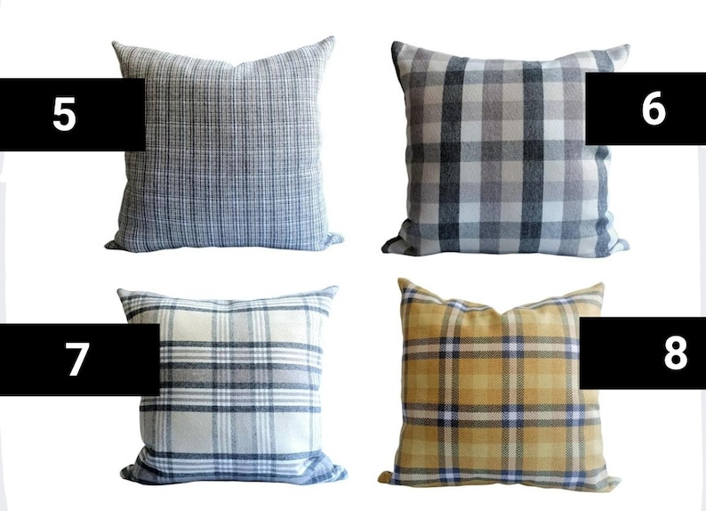 Op de afbeelding: Vier decoratieve kussens met ruitjespatronen. De kussens zijn in tinten grijs, blauw, beige en geel.