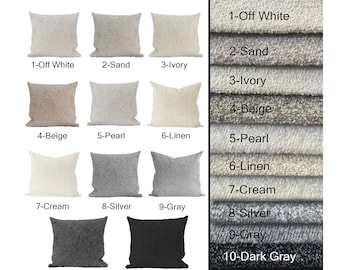 May include: Eleven different throw pillow covers in various colors and textures. The colors include off-white, sand, ivory, beige, pearl, linen, cream, silver, gray, dark gray, and black.