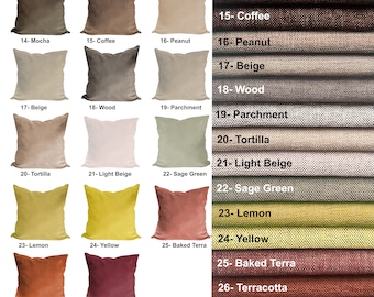 Puede incluir: Un conjunto de 14 fundas de cojín de diferentes colores, cada una con un color y una textura diferentes. Los colores incluyen moca, café, cacahuete, beige, madera, pergamino, tortilla, beige claro, verde salvia, limón, amarillo, tierra cocida, terracota y burdeos.