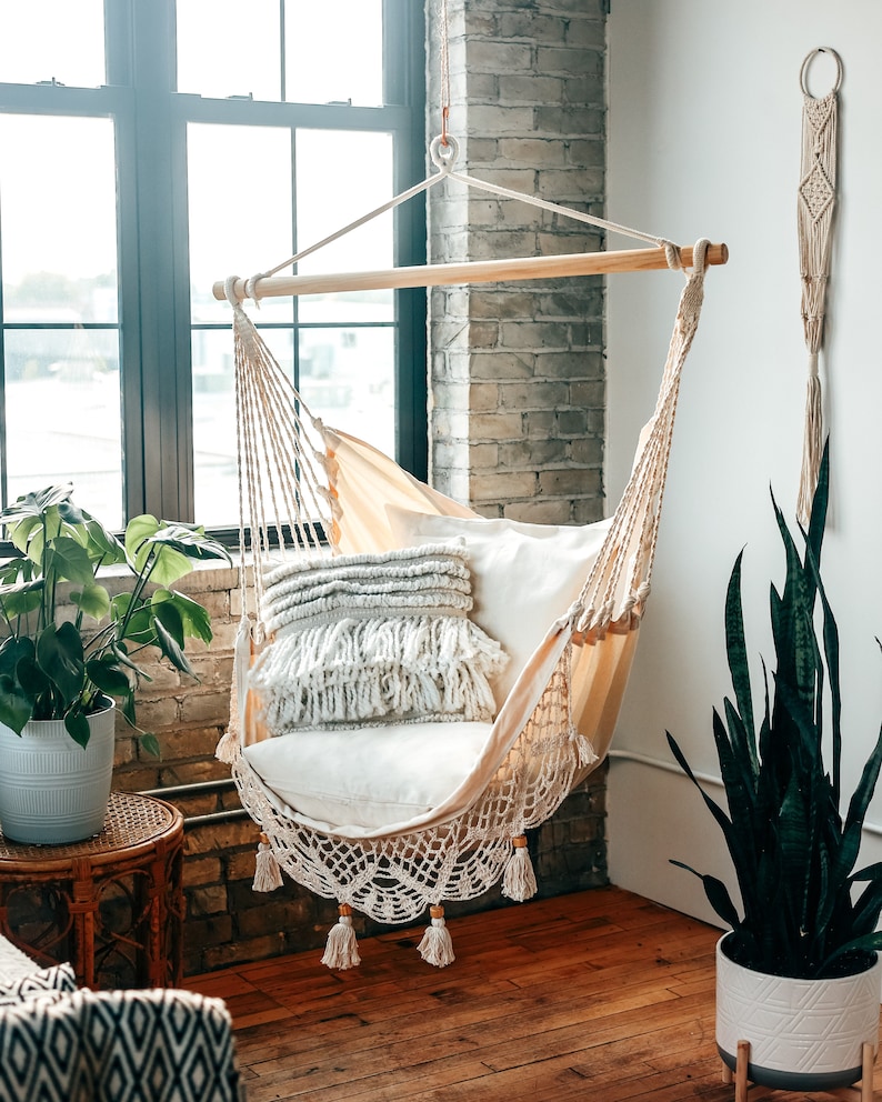 hammock chair indoors with brick wall