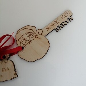 Handgefertigte maßgeschneiderte einzigartig personalisierte Santa Magic Key. Komplett mit Säcken lasergraviert mit Name(n) des Kindes.