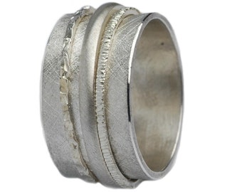 Wide matte ring in 925 silver with rotating bands