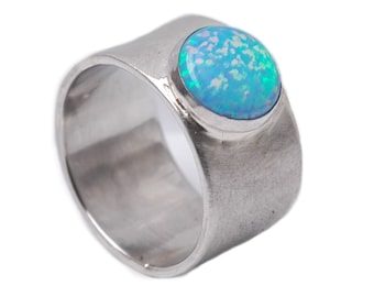 Wide silver ring with synthetic opal