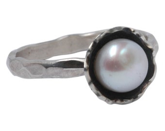 Silver ring with pearl
