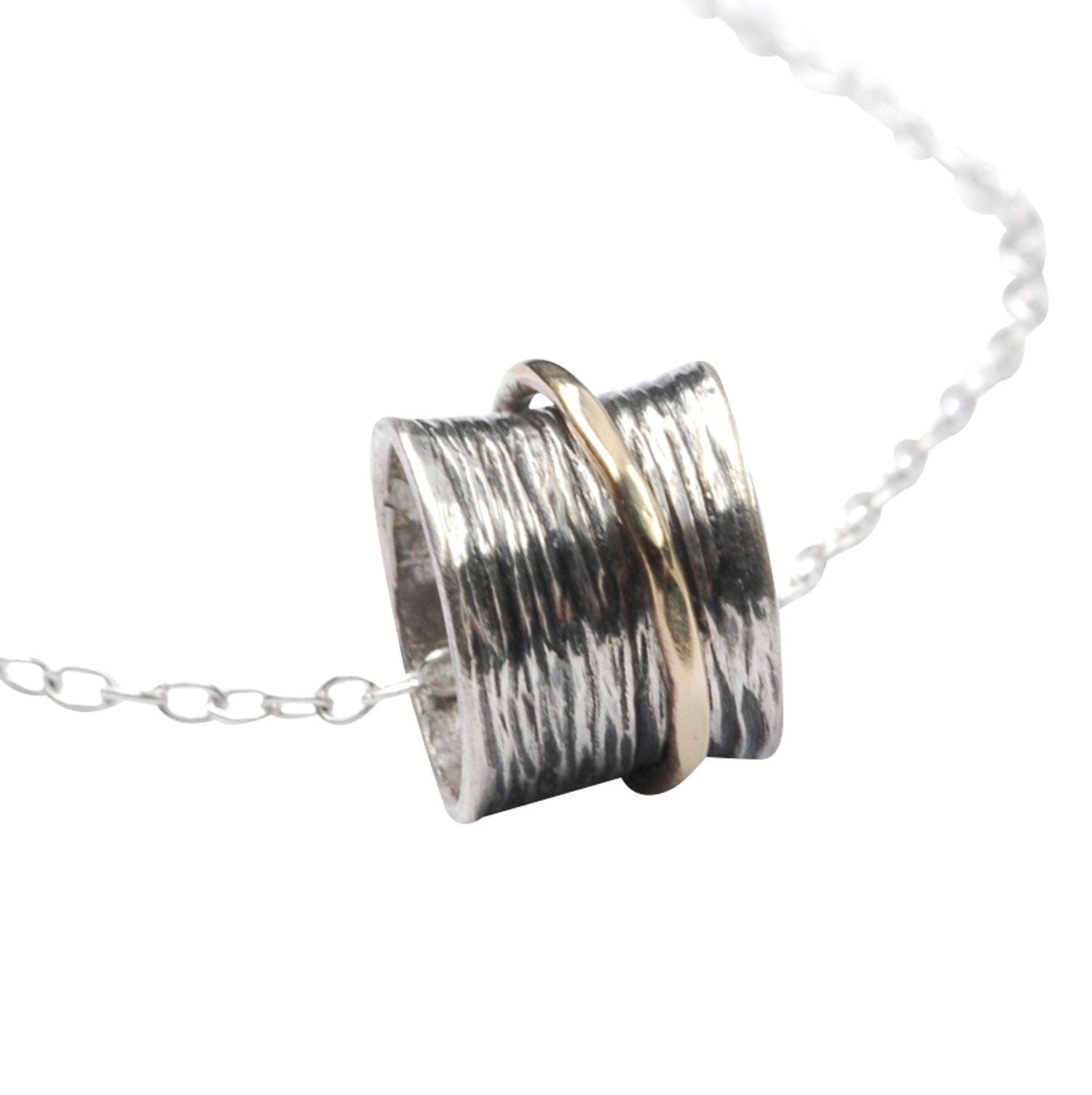 Silver pendant with a rotating ring 333 gold
