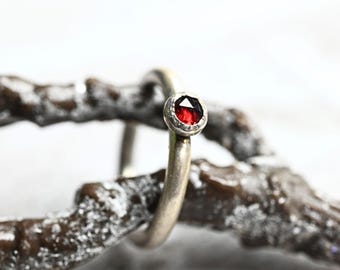 Decent garnet ring made of 925 silver