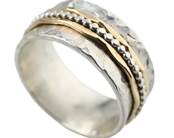 Bicolour ring with rotating bands made of 925 silver and 333 gold