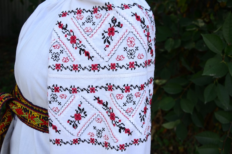 Vintage fashion Old Ukrainian dress Boho style Folk short shirt Geometry and floral pattern Beautiful embroidery Antique woman clothing